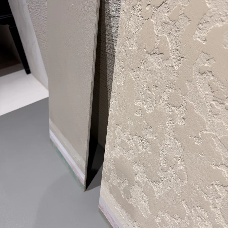 Smooth and textured Oltre microcement sample boards side by side