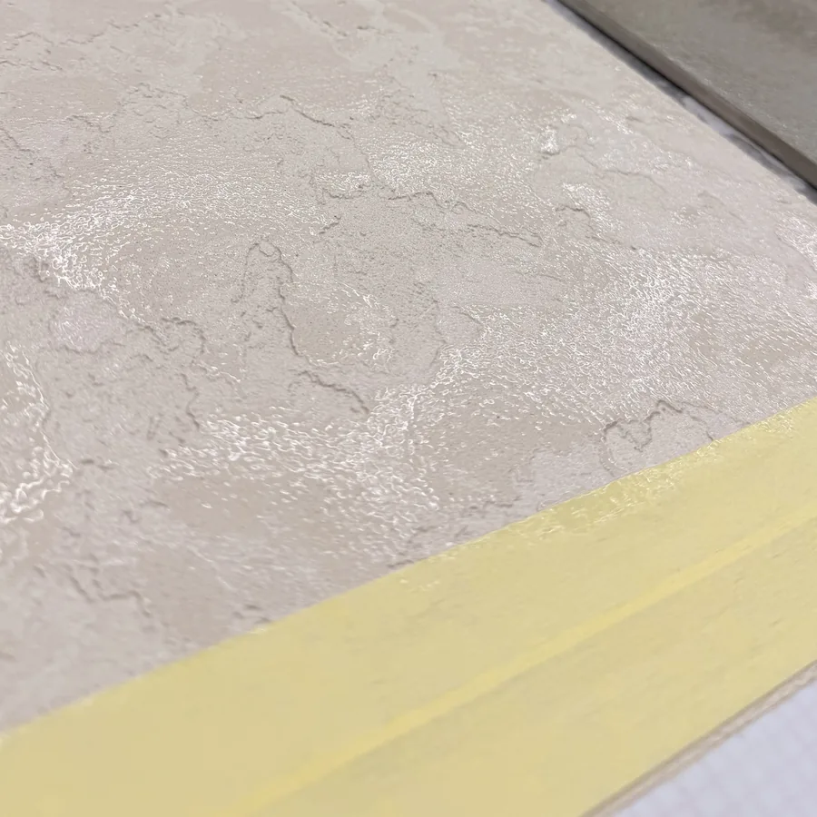 Textured Oltre microcement sample board after sealer applied